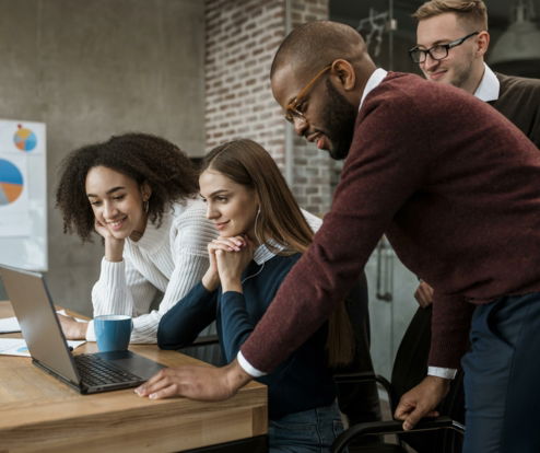 woman-showing-something-her-colleagues-meeting.jpg