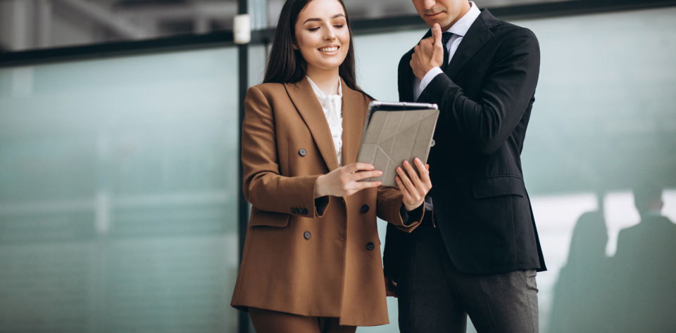 male-female-business-people-working-tablet-office.jpg